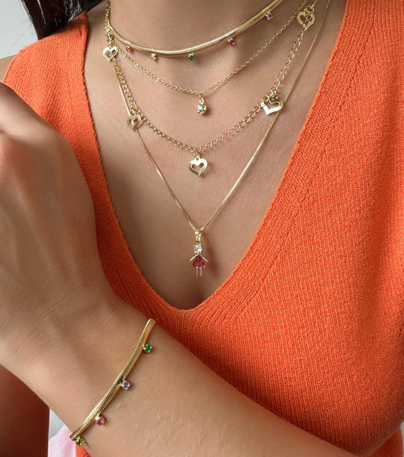 Colar duplo com coraçoes vazados banhado a ouro 18k