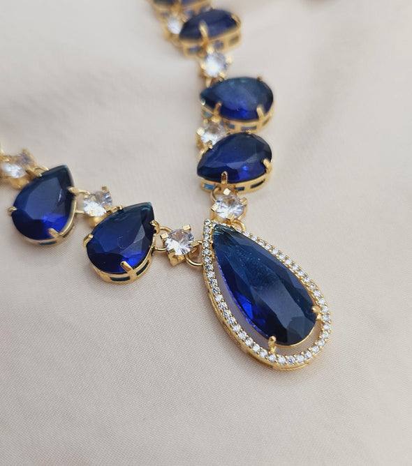 Conjunto colar e brinco com zirconias azul banhado a ouro 18k